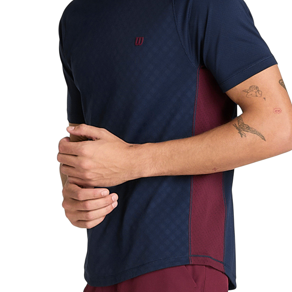 Wilson Men's Serve Out Tee in Classic Navy with stretch performance fabric